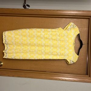 Yellow dress with while flower